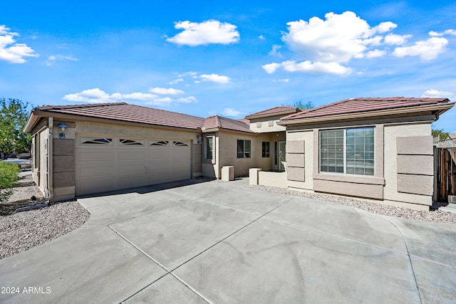 view of front of home with a garage