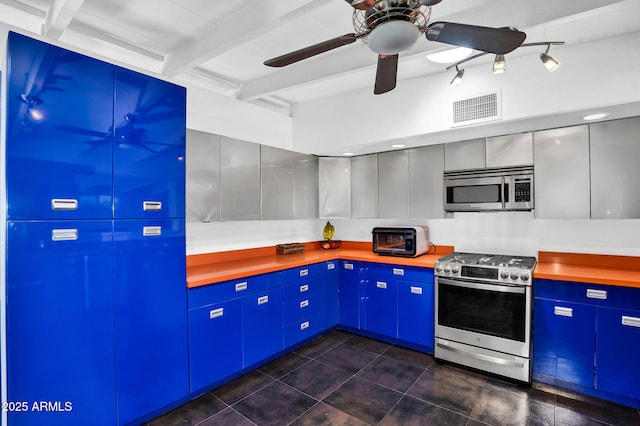 1029 E Palo Verde Dr, Phoenix, AZ 85014 - kitchen featuring appliances with stainless steel finishes, a ceiling fan, beamed ceiling, wooden counters, and dark tile patterned flooring