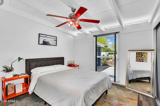 1029 E Palo Verde Dr, Phoenix, AZ 85014 - bedroom with access to outside, wood finished floors, and ceiling fan