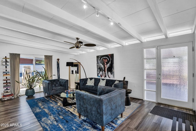 1029 E Palo Verde Dr, Phoenix, AZ 85014 - living area with rail lighting, wood finished floors, ceiling fan, and beamed ceiling