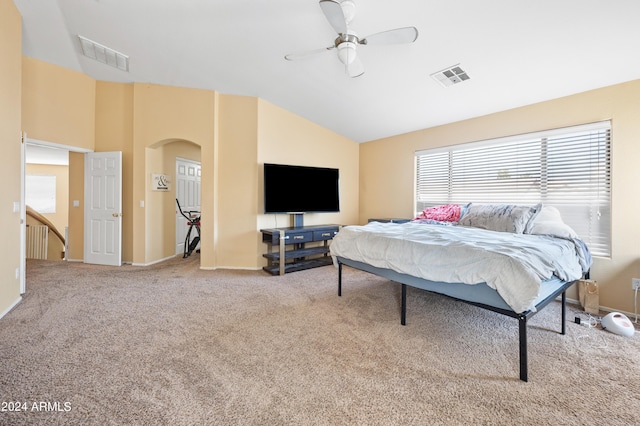 bedroom with lofted ceiling, carpet, and ceiling fan