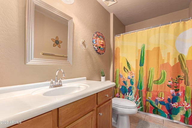 bathroom featuring tile patterned flooring, visible vents, toilet, a shower with shower curtain, and vanity