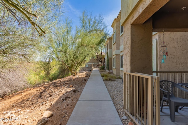 view of side of property with stucco siding