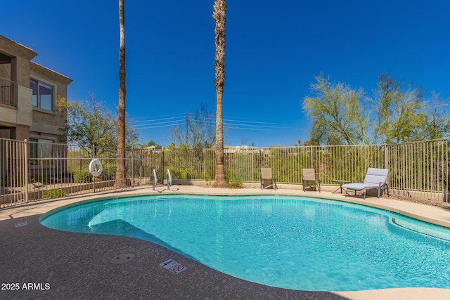 pool featuring fence