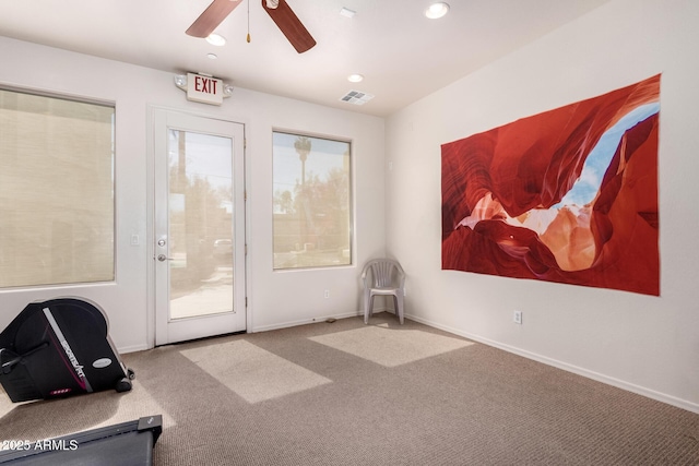 doorway to outside with visible vents, baseboards, ceiling fan, carpet floors, and recessed lighting