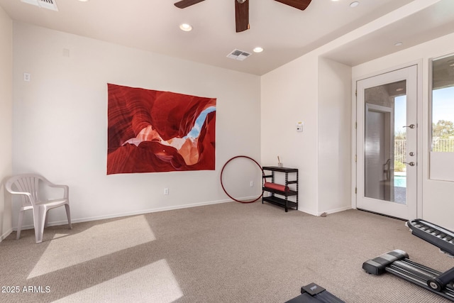 exercise area featuring visible vents, baseboards, carpet, ceiling fan, and recessed lighting