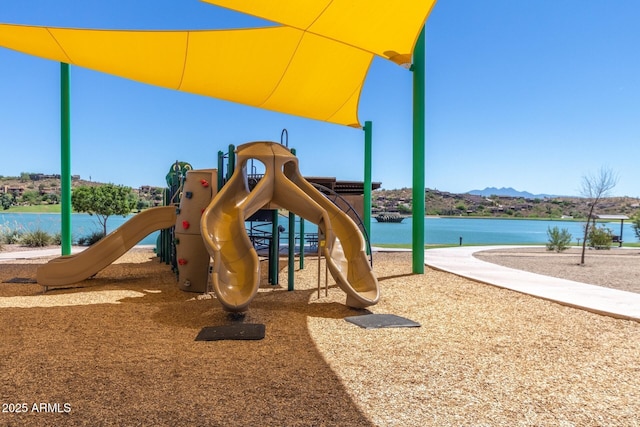 community playground featuring a water view