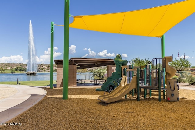 community playground featuring a water view