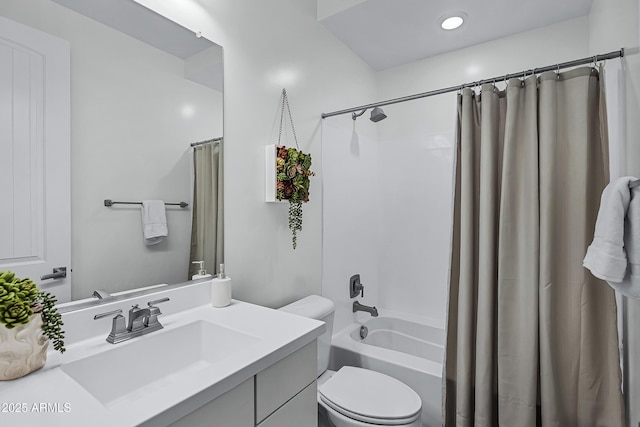 full bathroom with shower / tub combo, vanity, and toilet