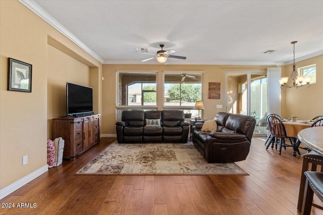 856 E Harmony Way, San Tan Valley, AZ 85140 - living area featuring a chandelier, ornamental molding, plenty of natural light, a ceiling fan, and hardwood / wood-style flooring