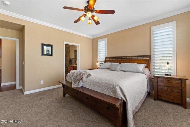 856 E Harmony Way, San Tan Valley, AZ 85140 - bedroom with carpet flooring, crown molding, baseboards, a ceiling fan, and connected bathroom