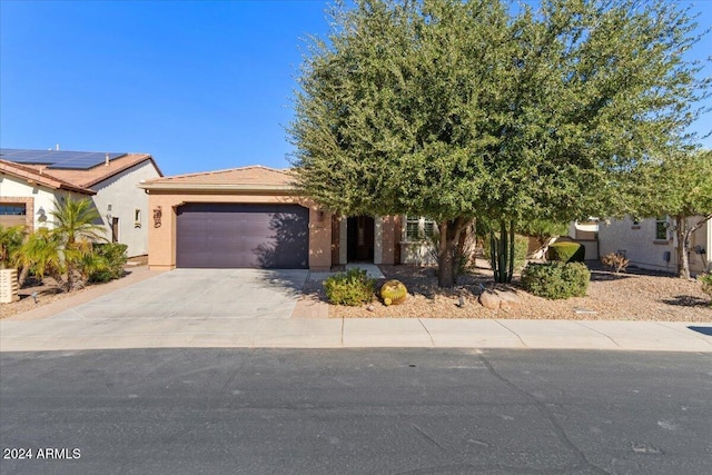 856 E Harmony Way, San Tan Valley, AZ 85140 - view of front of house with an attached garage, driveway, stucco siding, and a tile roof