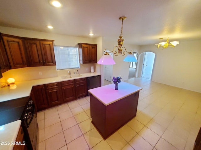 513 W Sherwood Dr, Payson, AZ 85541 - kitchen with arched walkways, dishwasher, light countertops, a sink, and a notable chandelier