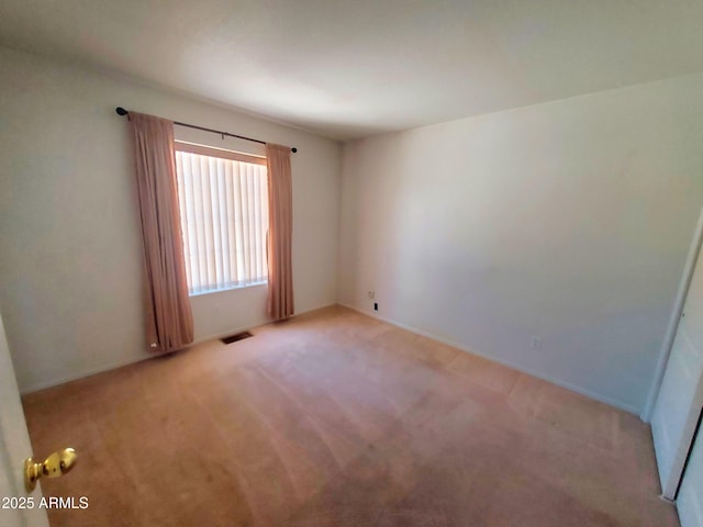 513 W Sherwood Dr, Payson, AZ 85541 - spare room featuring visible vents and light colored carpet
