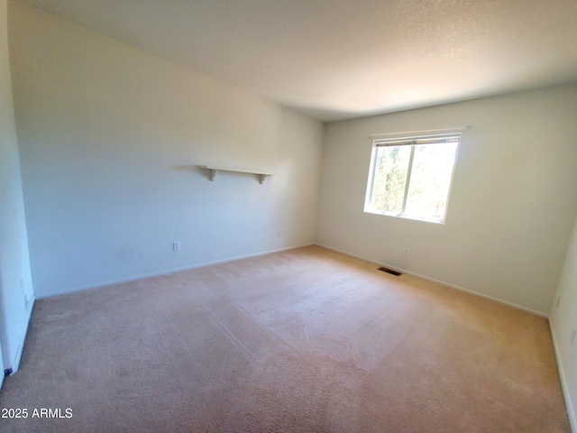 513 W Sherwood Dr, Payson, AZ 85541 - empty room with light colored carpet, baseboards, and visible vents