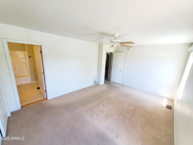 513 W Sherwood Dr, Payson, AZ 85541 - unfurnished bedroom with visible vents, light colored carpet, a ceiling fan, and ensuite bathroom
