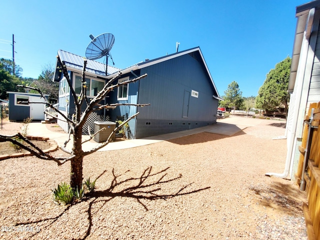 513 W Sherwood Dr, Payson, AZ 85541 - back of house with a patio area, metal roof, and crawl space