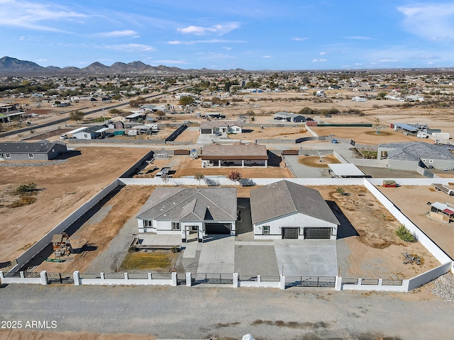 drone / aerial view featuring a mountain view