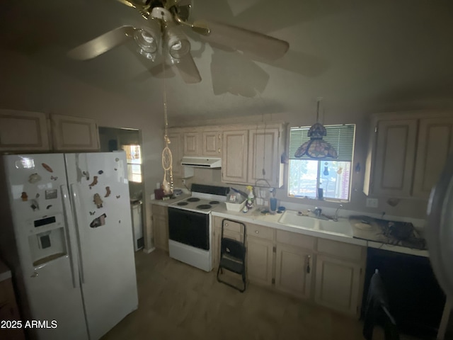 kitchen with white appliances, pendant lighting, sink, and ceiling fan