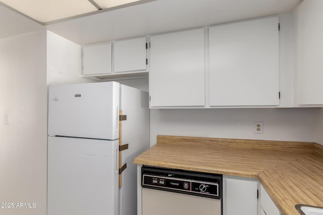 11026 N 28th Dr Unit 81, Phoenix, AZ 85029 - kitchen with white appliances, light countertops, and white cabinetry
