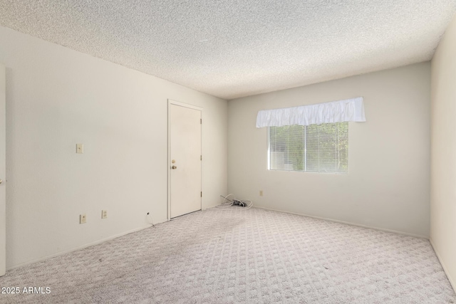 11026 N 28th Dr Unit 81, Phoenix, AZ 85029 - unfurnished room with carpet floors and a textured ceiling