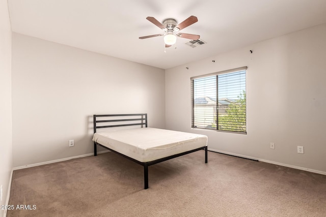 466 N 10th Pl, Coolidge, AZ 85128 - carpeted bedroom with baseboards and a ceiling fan