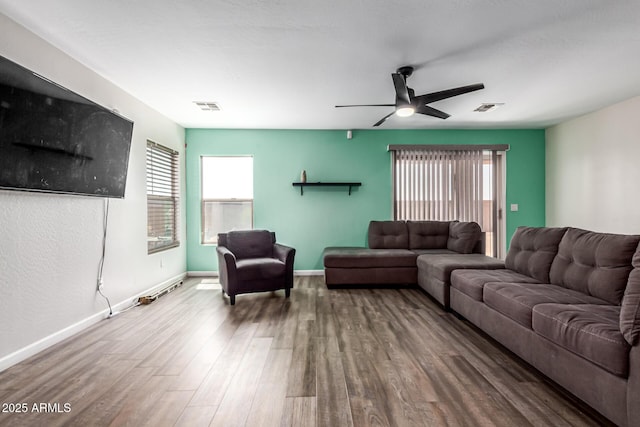 466 N 10th Pl, Coolidge, AZ 85128 - living area featuring a ceiling fan and wood finished floors