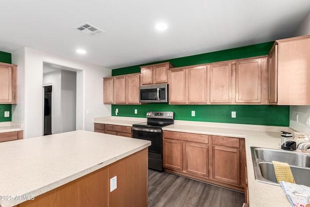 466 N 10th Pl, Coolidge, AZ 85128 - kitchen featuring electric stove, stainless steel microwave, light countertops, dark wood finished floors, and recessed lighting