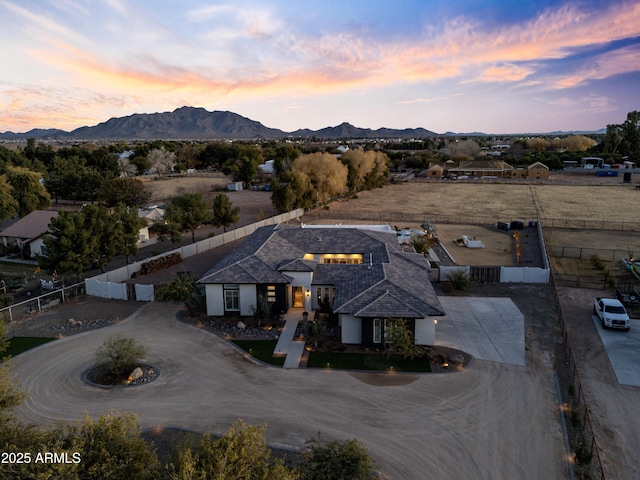 aerial view at dusk with a mountain view