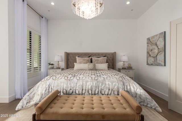 22756 N 91st Way, Scottsdale, AZ 85255 - bedroom with a chandelier, baseboards, wood finished floors, and recessed lighting