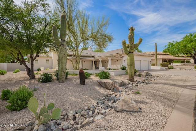 22756 N 91st Way, Scottsdale, AZ 85255 - ranch-style house featuring an attached garage, concrete driveway, and stucco siding