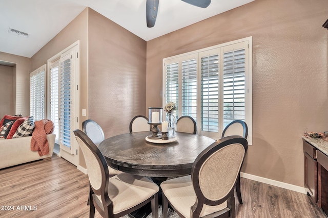 dining space featuring light hardwood / wood-style floors