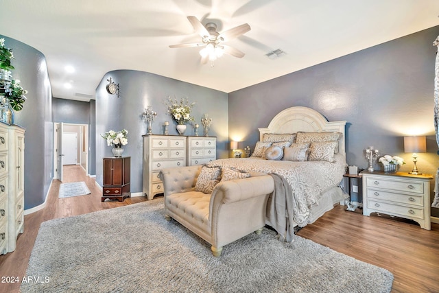 bedroom featuring hardwood / wood-style flooring and ceiling fan