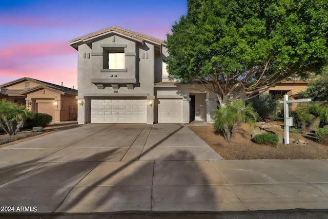 view of front of property with a garage