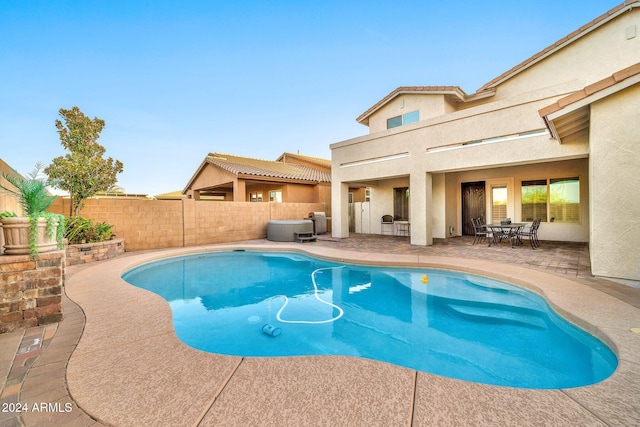 view of pool with a patio