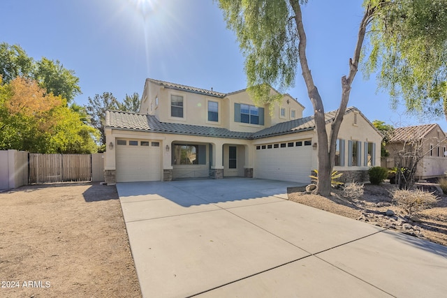 view of front of property featuring a garage