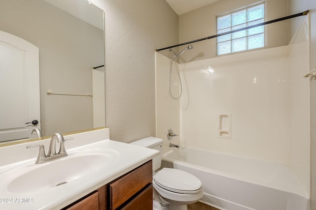 full bathroom featuring  shower combination, vanity, and toilet