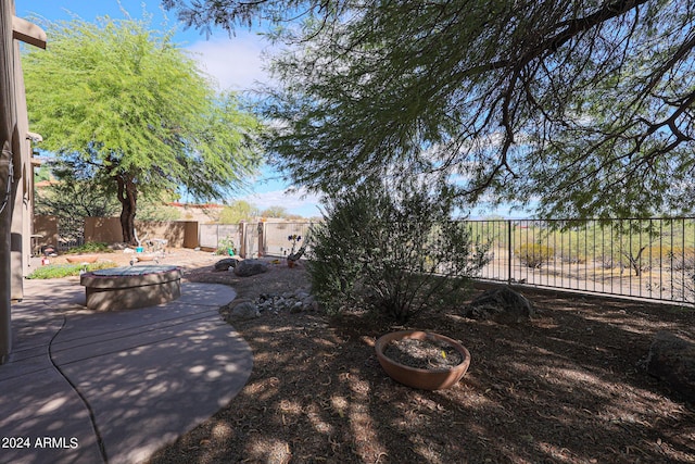 1880 W Roderick Ln, Wickenburg, AZ 85390 - view of yard featuring an outdoor fire pit, a fenced backyard, and a patio area