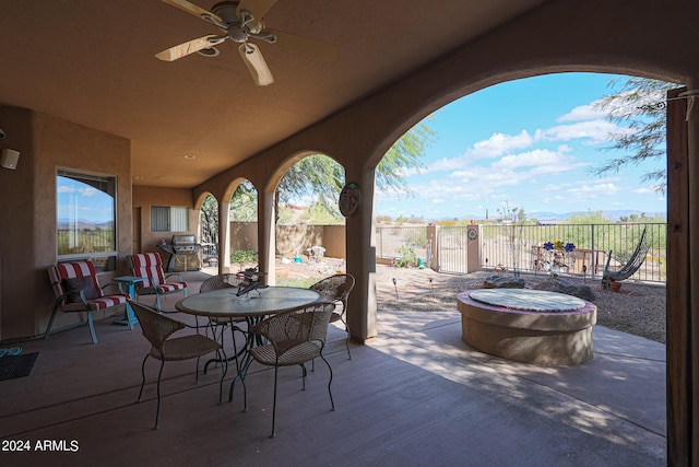 1880 W Roderick Ln, Wickenburg, AZ 85390 - view of patio / terrace with outdoor dining space, fence, and ceiling fan