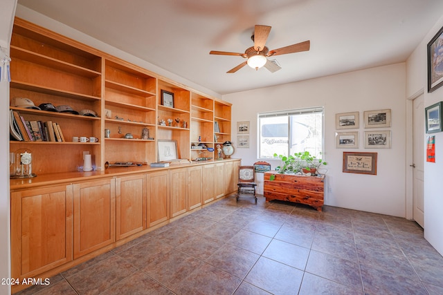 office space featuring light tile patterned floors and ceiling fan