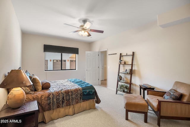 bedroom with light carpet and ceiling fan