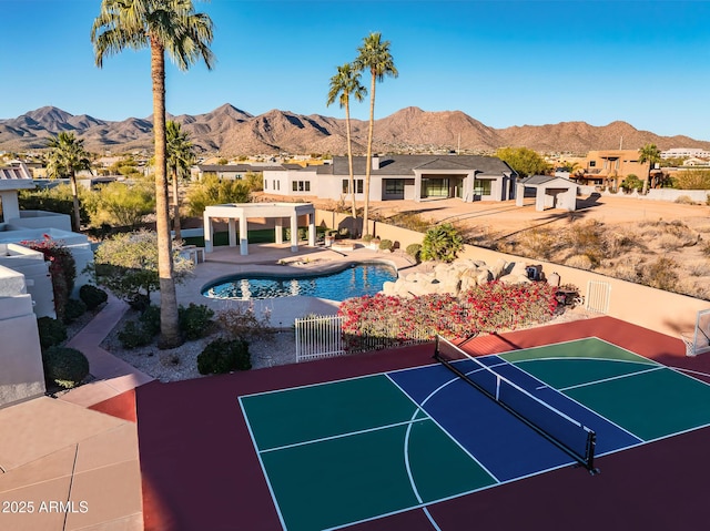 exterior space with a mountain view, a pergola, and a patio