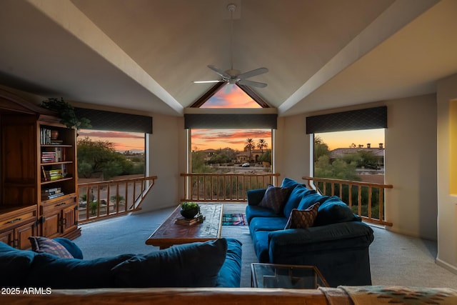 carpeted living room with lofted ceiling and ceiling fan