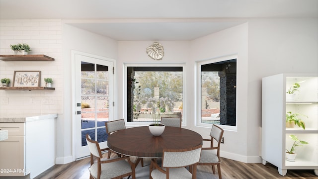 dining area featuring dark hardwood / wood-style floors