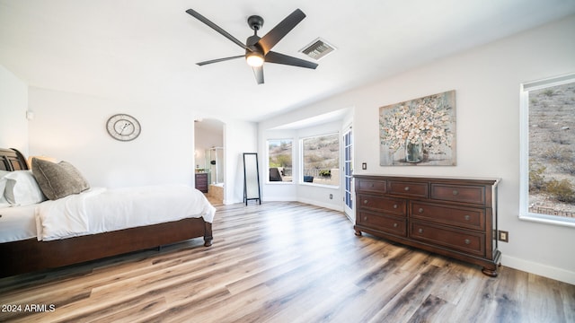 bedroom featuring ceiling fan and hardwood / wood-style floors