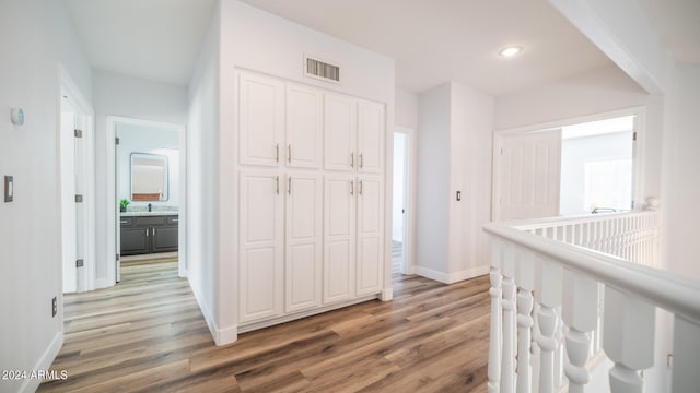 corridor with dark wood-type flooring