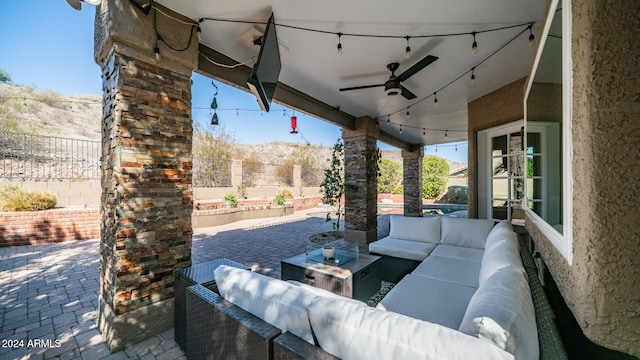 view of patio / terrace with outdoor lounge area and ceiling fan