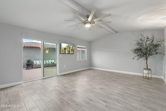 empty room featuring a ceiling fan, light wood-type flooring, and baseboards