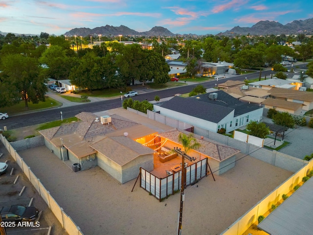 aerial view at dusk of a mountain view and a residential view