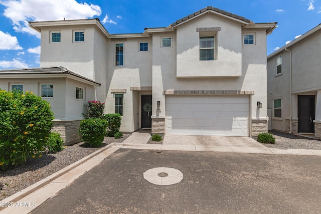 5460 S Dillon Cir, Mesa, AZ 85212 - view of front of home featuring stucco siding, a garage, and driveway